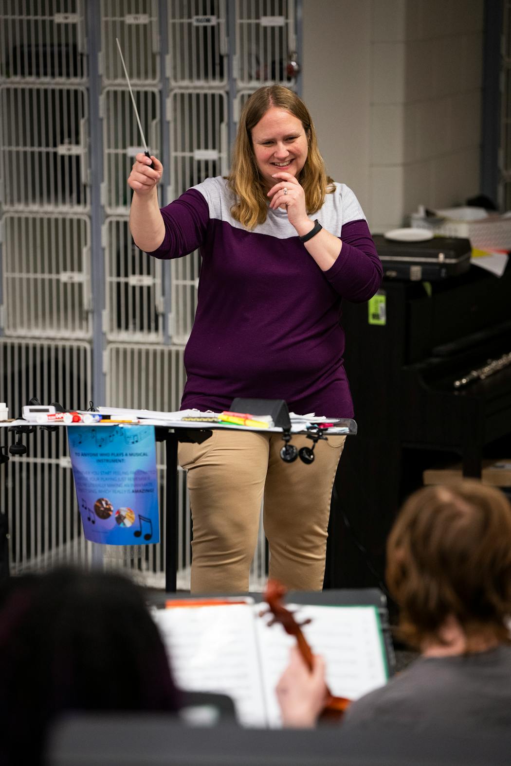 Music teacher Denae Olsen leads the first period orchestra class at Murray Middle School on Wednesday, April 26, 2023 in St. Paul.