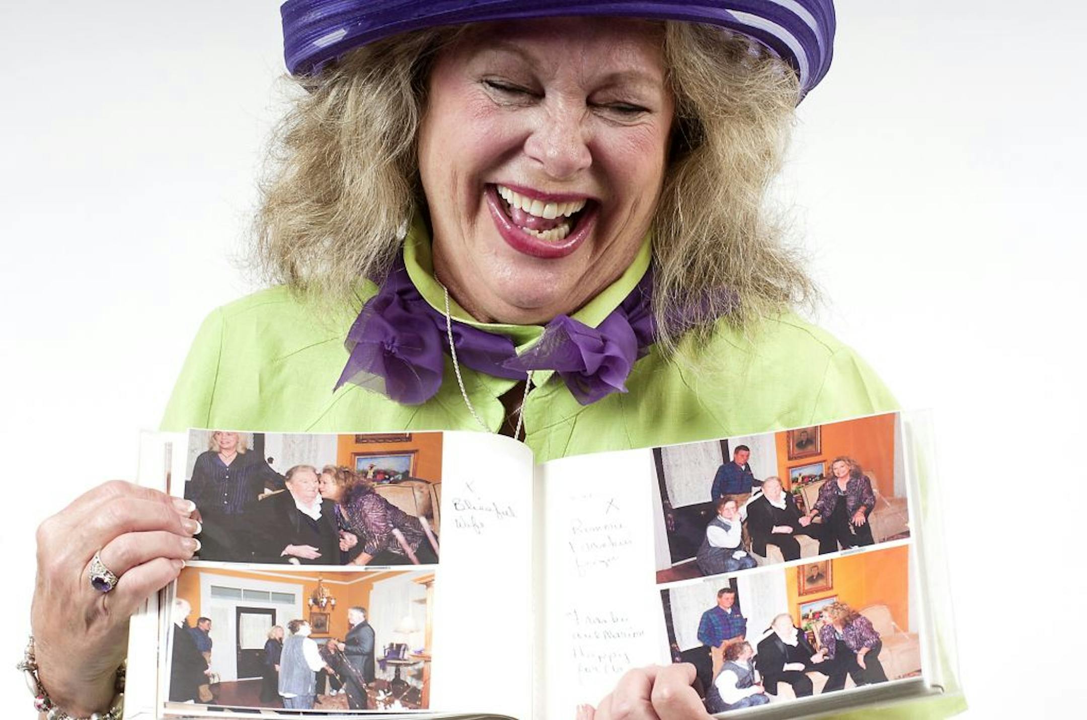 Judith Coghlan Lewis, wife of rock 'n' roll legend Jerry Lee Lewis, shows her wedding photo album in the studio of The Natchez Democrat in Natchez, Miss. She married Jerry Lee Lewis March 9 in Natchez.
