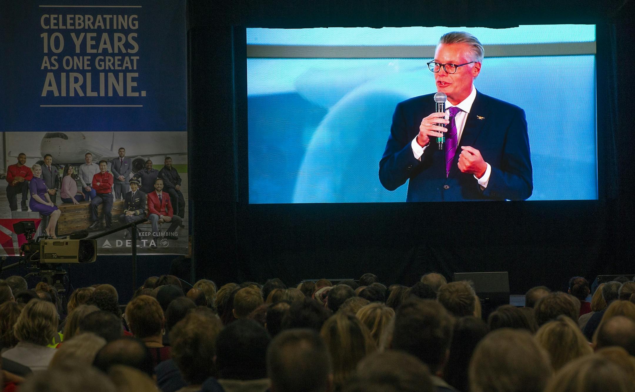 CEO of Delta Air Lines, Ed Bastian, greeted employees via a live stream from Atlanta, as they celebrated its 10-year anniversary of the Northwest merger (the U.S. DOJ officially approved the merger Oct. 29, 2008) during a party at the MSP hangar, Monday, October 29, 2018 in Bloomington, MN. About 600 employees showed up for a live stream connecting Minneapolis and Atlanta hangar parties through a large screen led by CEO of Delta Air Lines, Ed Bastian in Atlanta.