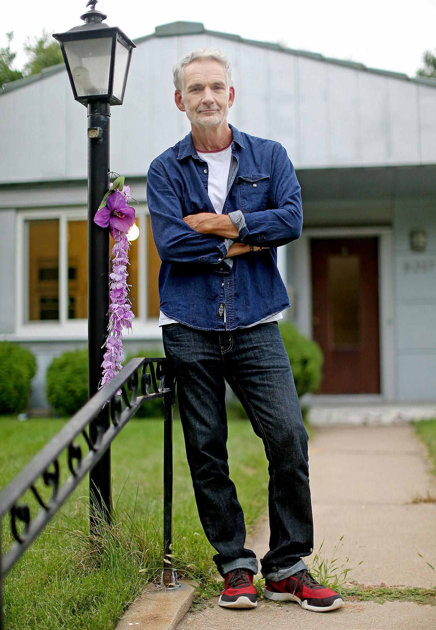 Buck Holzemer stood in front of his 1950 historic Lustron home, Thursday, August 18, 2016 in Minneapolis, MN. His home is lined along a small strip on Nicollet Ave., which he has restored and preserved. ] (ELIZABETH FLORES/STAR TRIBUNE) ELIZABETH FLORES &#x2022; eflores@startribune.com