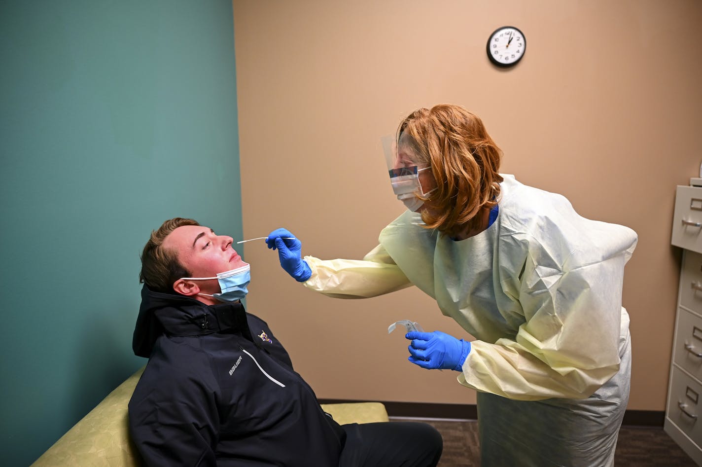 Angie Stransky, a nurse administrator for Mayo Clinic Health System, tested Minnesota State hockey player Ryan Edquist for COVID-19 on Oct. 20.