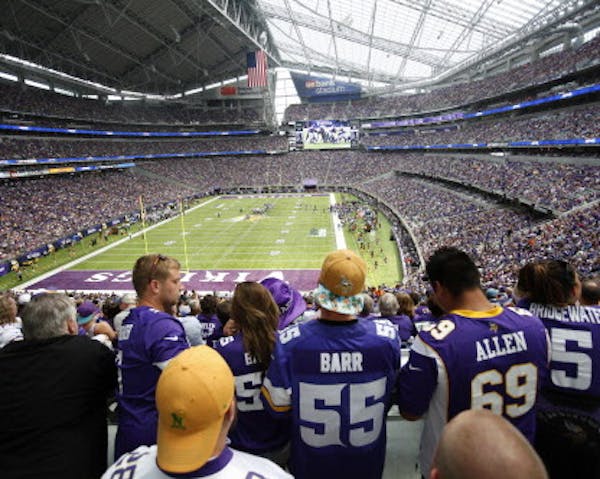 Fans watch in U.S. Bank Stadium during the second half of an NFL preseason football game between the Minnesota Vikings and the San Diego Chargers Sund