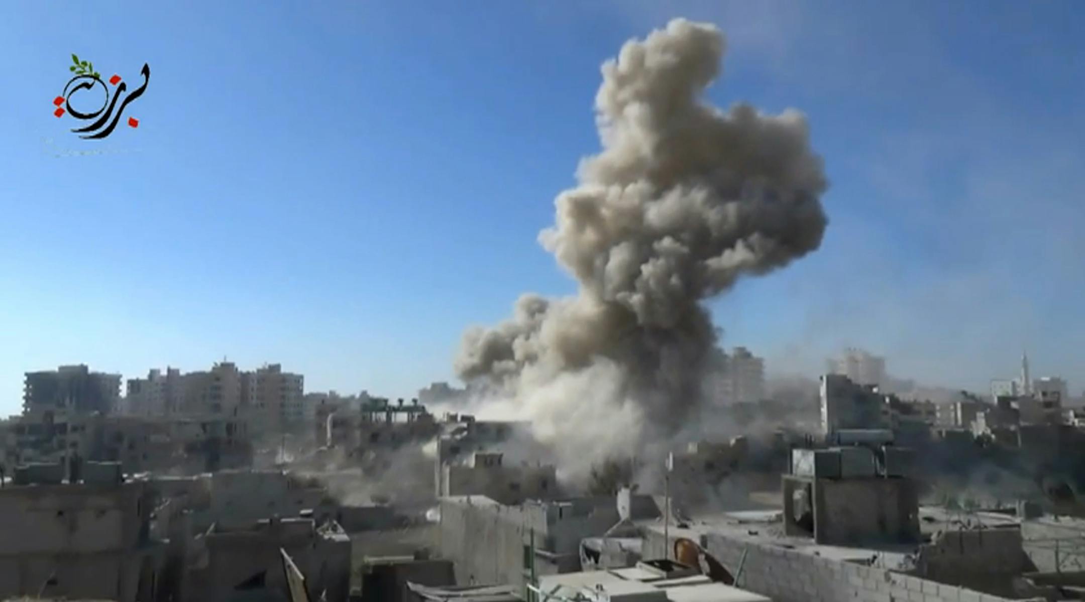 This image made from citizen journalist video posted by the Shaam News network, which is consistent with AP reporting, shows shelling in the Barzeh area of Damascus, Syria Tuesday, Sept. 17, 2013.