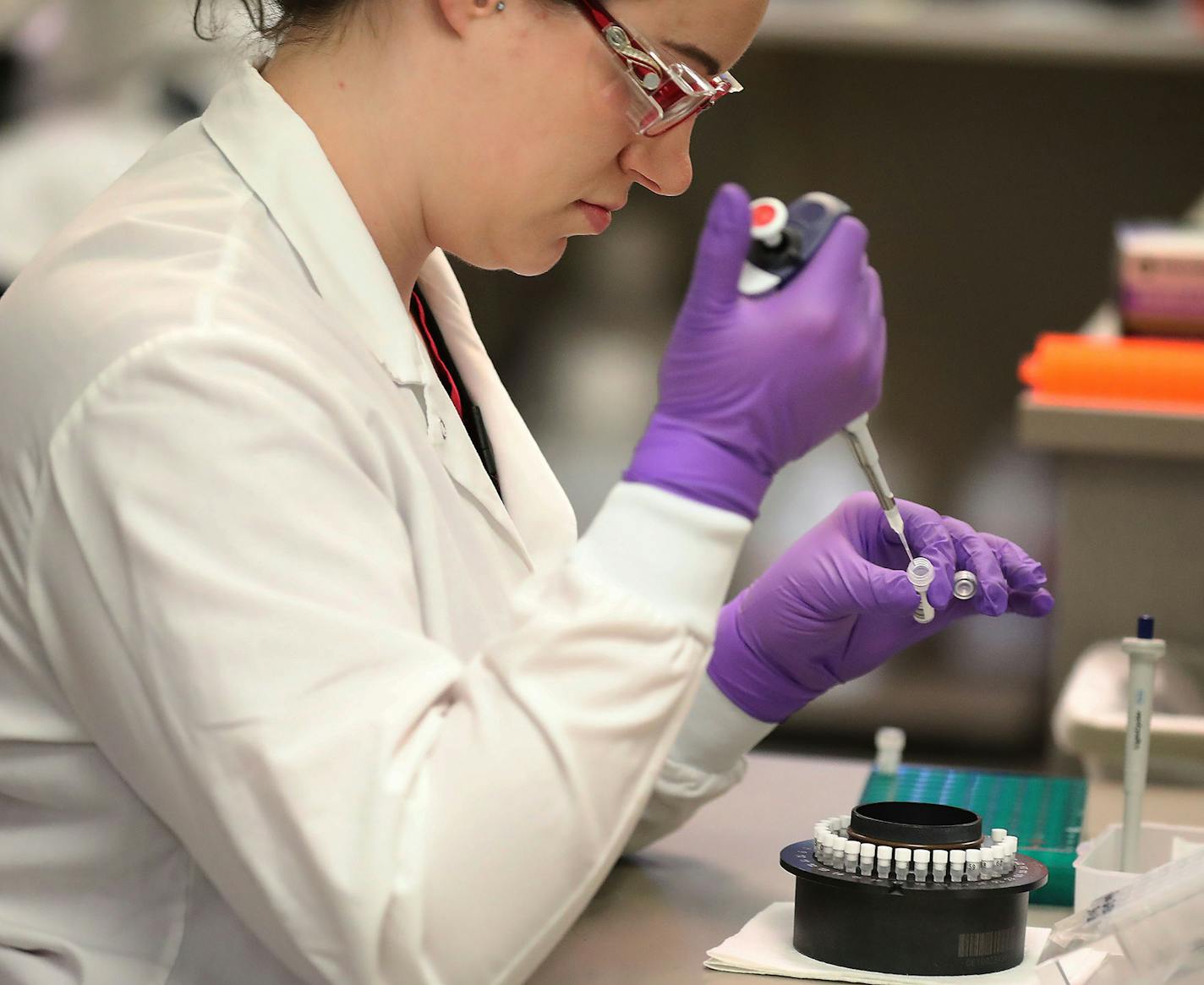 Validation for Coronavirus testing is taking place at Mayo Clinic where Heather Peters, a lab technologist, introduces a re-agent in the extracting of RNA from test samples in the Mayo virology lab Tuesday, March 10, 2020 in Rochester, MN.] DAVID JOLES &#x2022; david.joles@startribune.com Testing for Coronavirus is being perfected at Mayo Clinic. See the process from when specimens arrive, how they are handled, processed and tested. Visuals include scientists working under hooded vents, using te