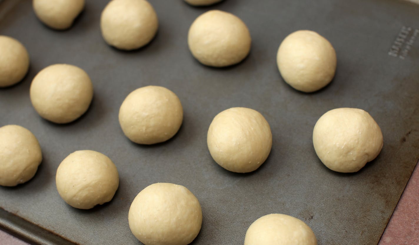 Pretzel bread dough can be made into several shapes, including breadsticks or buns for burgers or sliders.