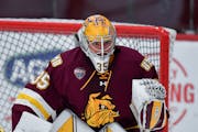 Minnesota Duluth goalie Zach Stejskal (35) warms up before an NCAA hockey game against Cornell on Friday, Oct. 27, 2023 in Ithaca, N.Y. (AP Photo/Adri