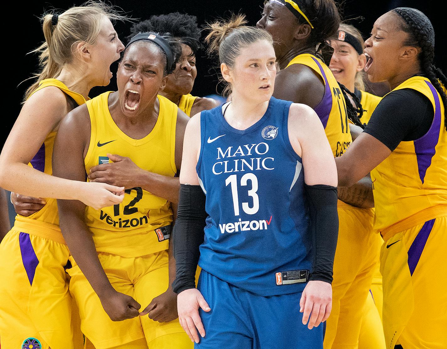 Chelsea Gray (12) celebrated with teammates after making a buzzer beating game winning shot. The LA Sparks beat the Minnesota Lynx 77-76. ] CARLOS GONZALEZ � cgonzalez@startribune.com � May 20, 2018, Minneapolis, MN, Target Center, WNBA, Minnesota Lynx vs. Los Angeles Sparks