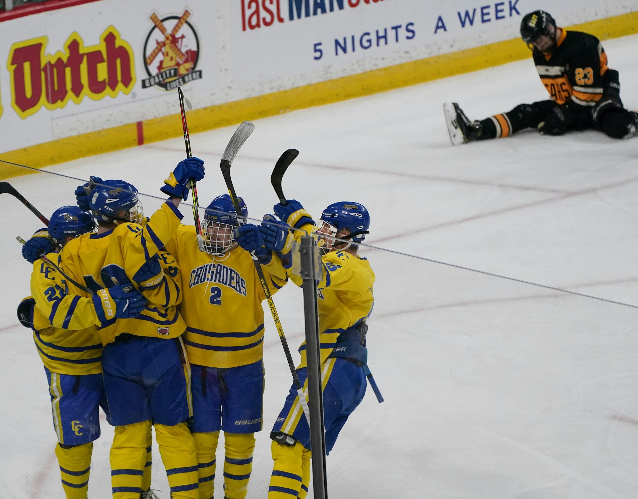 St. Cloud Cathedral celebrated after Bradyn Balfanz scored in the first period. [Shari L. Gross, Star Tribune]