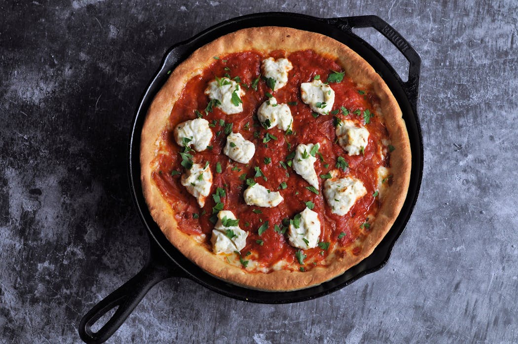 Hot Soppressata and Ricotta Skillet Pizza is similar to the deep-dish variations you’d find in Chicago. 
