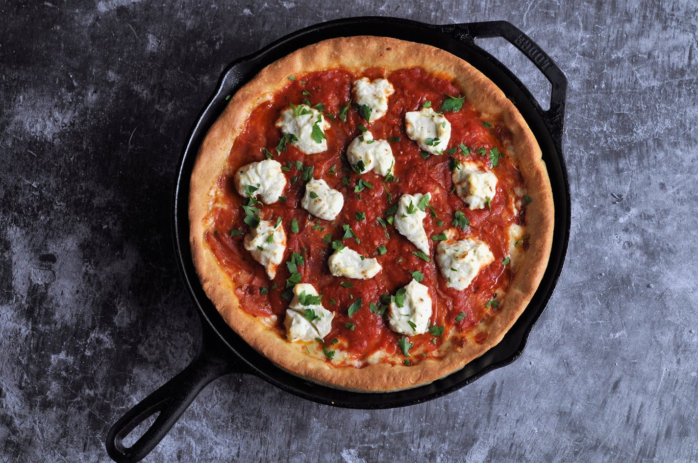 Hot Soppressata and Ricotta Skillet Pizza is similar to the deep dish variations you'd find in Chicago. Meredith Deeds, Special to the Star Tribune