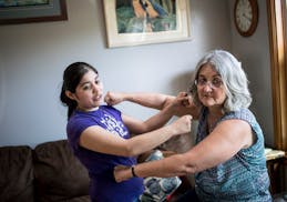 Anhelica Van Den Burgh, 24, reenacted a situation in which a foster child that was in the care of her and mother, Marsha Van Den Burgh, right, pulled 