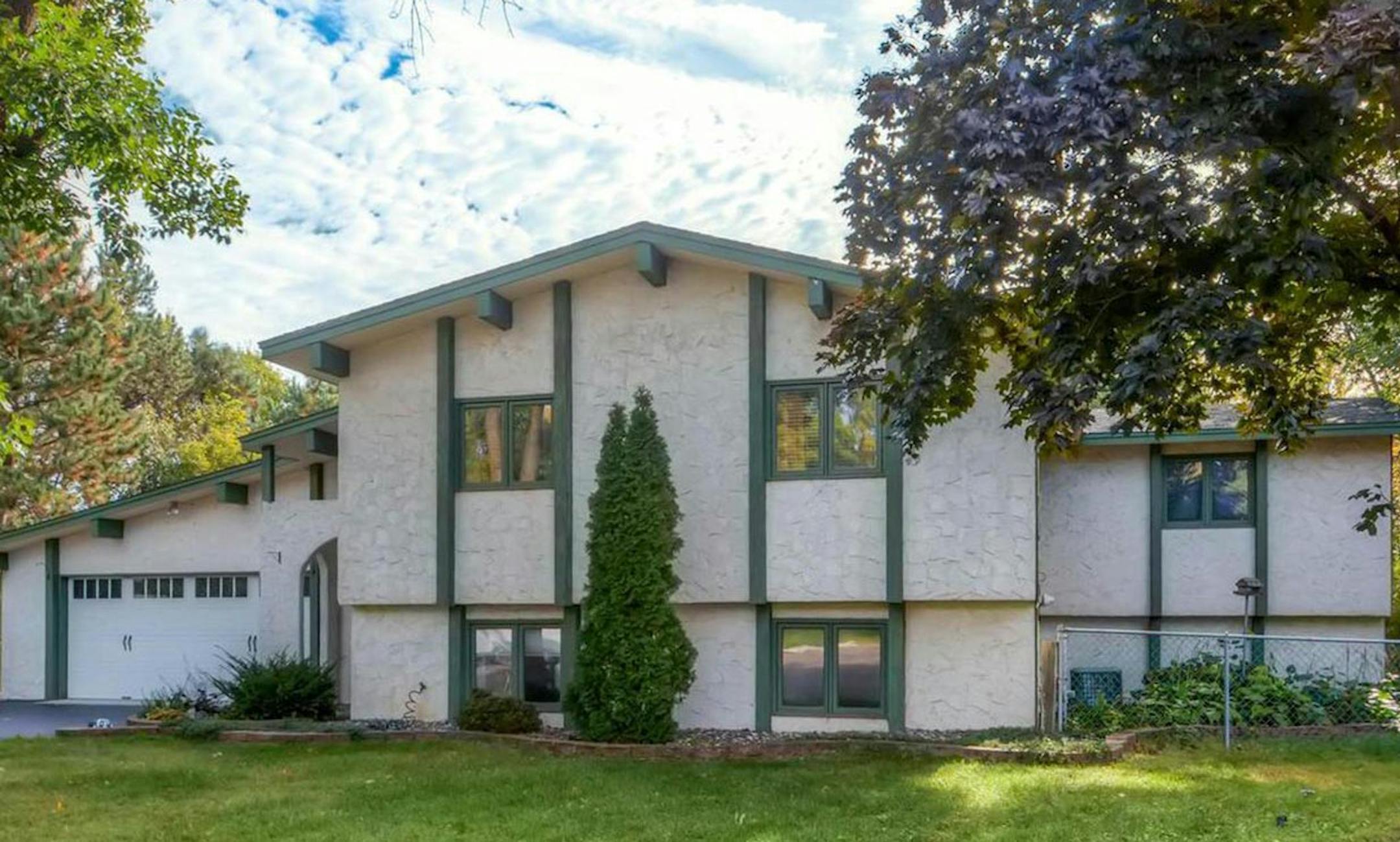 Anoka
Built in 1974, this five-bedroom, three-bath house has 3,756 square feet and features three bedrooms on the upper level, fireplace, eat-in kitchen, formal dining room, full finished walkout basement, deck, patio, hot tub and three-car garage with heated shop in the back. Listed by Scott Westensee, Engel & Volkers Minneapolis Downtown, 612-338-3836.