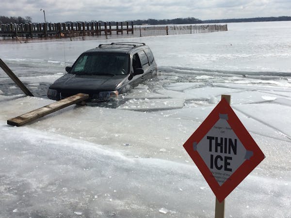 This SUV went into the ice on Lake Minnetonka's Wayzata Bay about 11 a.m. Wednesday. It was the first vehicle to go through ice in Hennepin County thi
