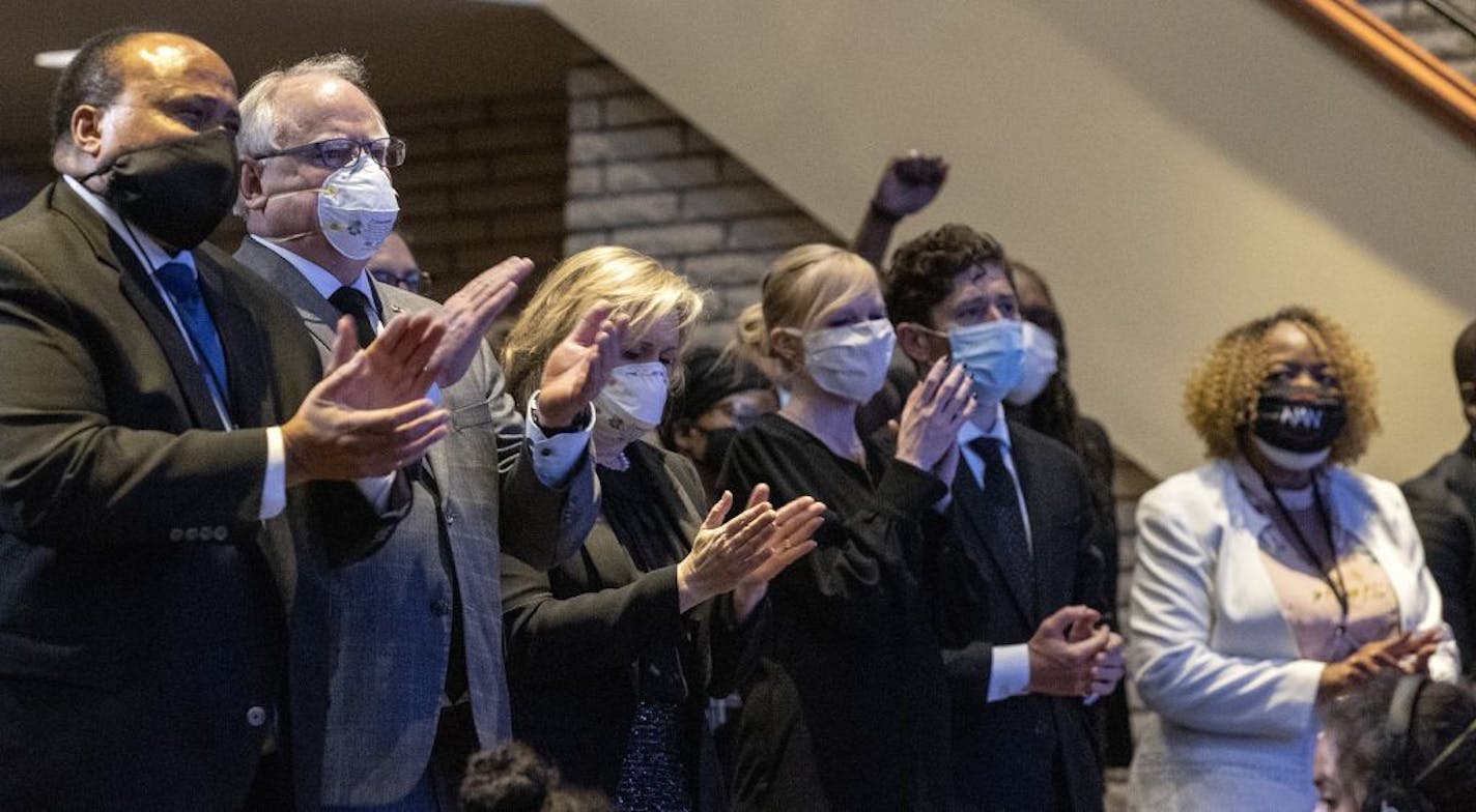 From left, Martin Luther King III, Minnesota Gov. Tim Walz, Gwen Walz, Sarah Clarke, Minneapolis Mayor Jacob Frey and Gwen Carr, the mother of Eric Garner, during a memorial service for George Floyd at North Central University in Minneapolis on Wenesday, June 4, 2020.