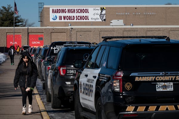 Students leave school Friday, Feb. 10, 2023 at St. Paul Harding Senior High School in St. Paul. A person was stabbed and killed at the school Friday a