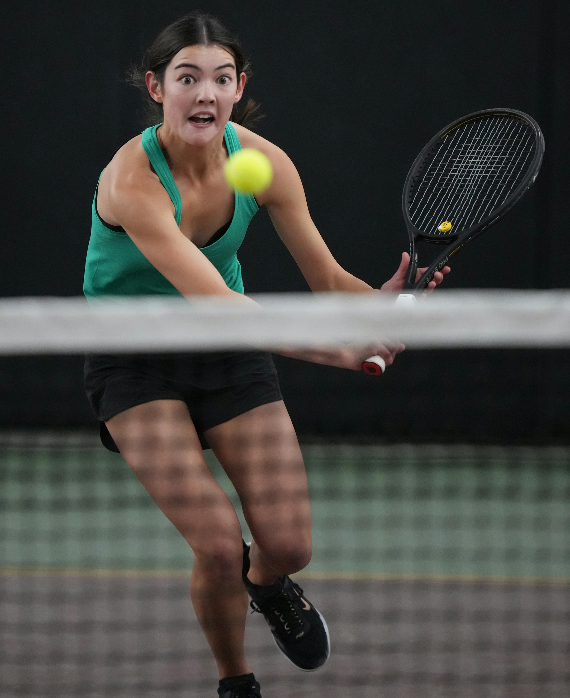 Claire Loftus of Mayo returns a volley on the way to beating Rashi Singh of Edina at the Baseline Tennis Center in Minneapolis, Minnesota on Wednesday, Oct. 25, 2023.