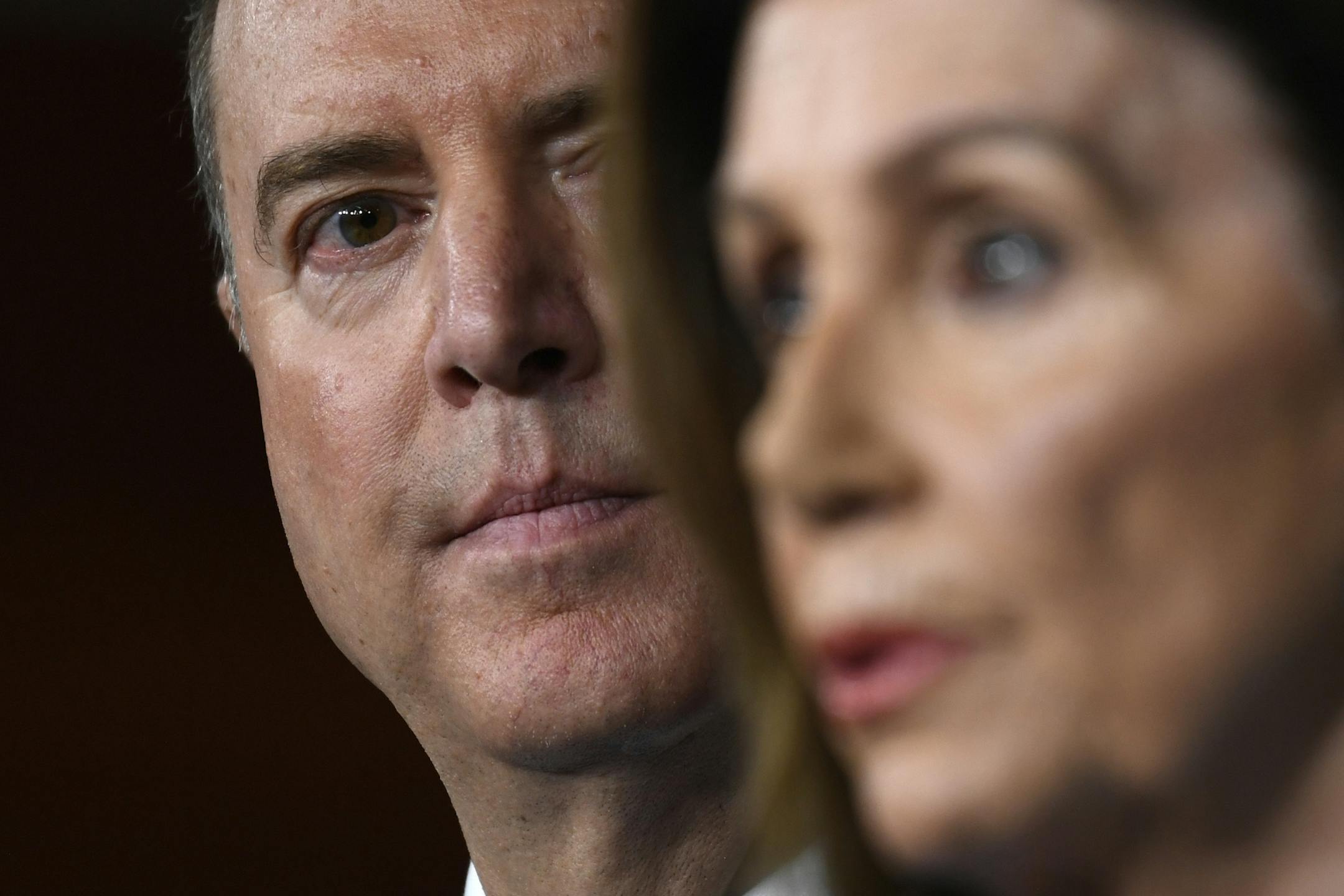 House Intelligence Committee Chairman Rep. Adam Schiff, D-Calif., left, listens as House Speaker Nancy Pelosi of Calif., right, speaks during a news conference on Capitol Hill in Washington, Wednesday, Oct. 2, 2019 (AP Photo/Susan Walsh)