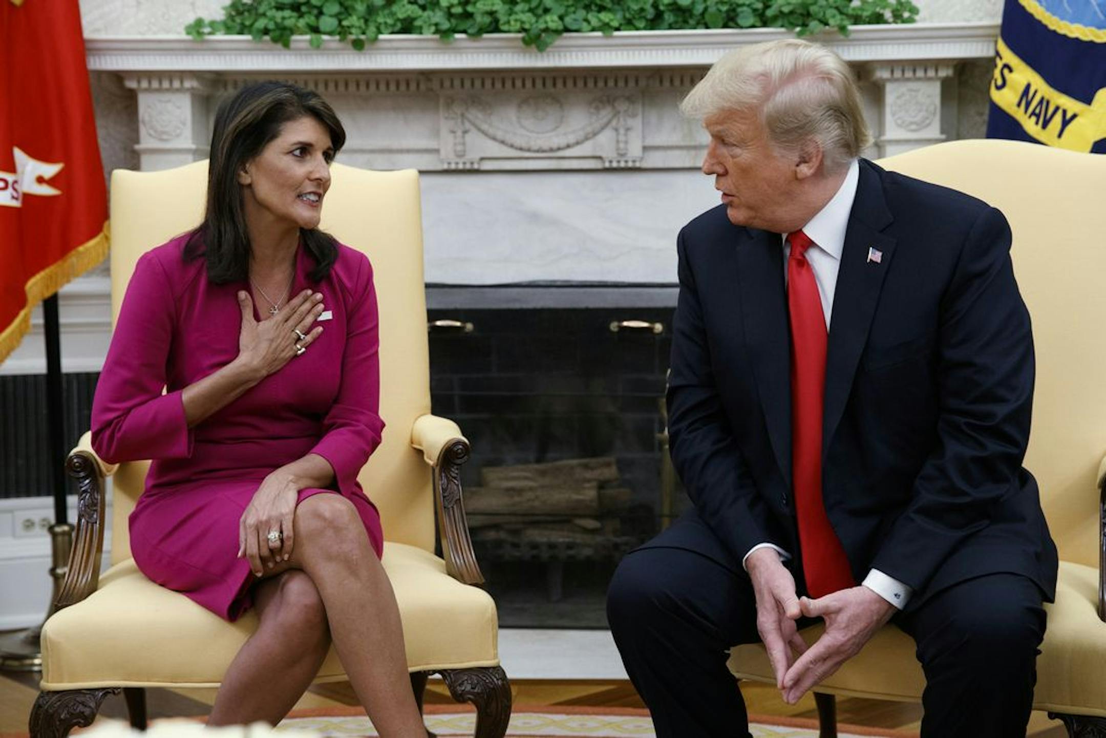President Donald Trump meets with outgoing U.S. Ambassador to the United Nations Nikki Haley in the Oval Office of the White House, Tuesday, Oct. 9, 2018, in Washington.