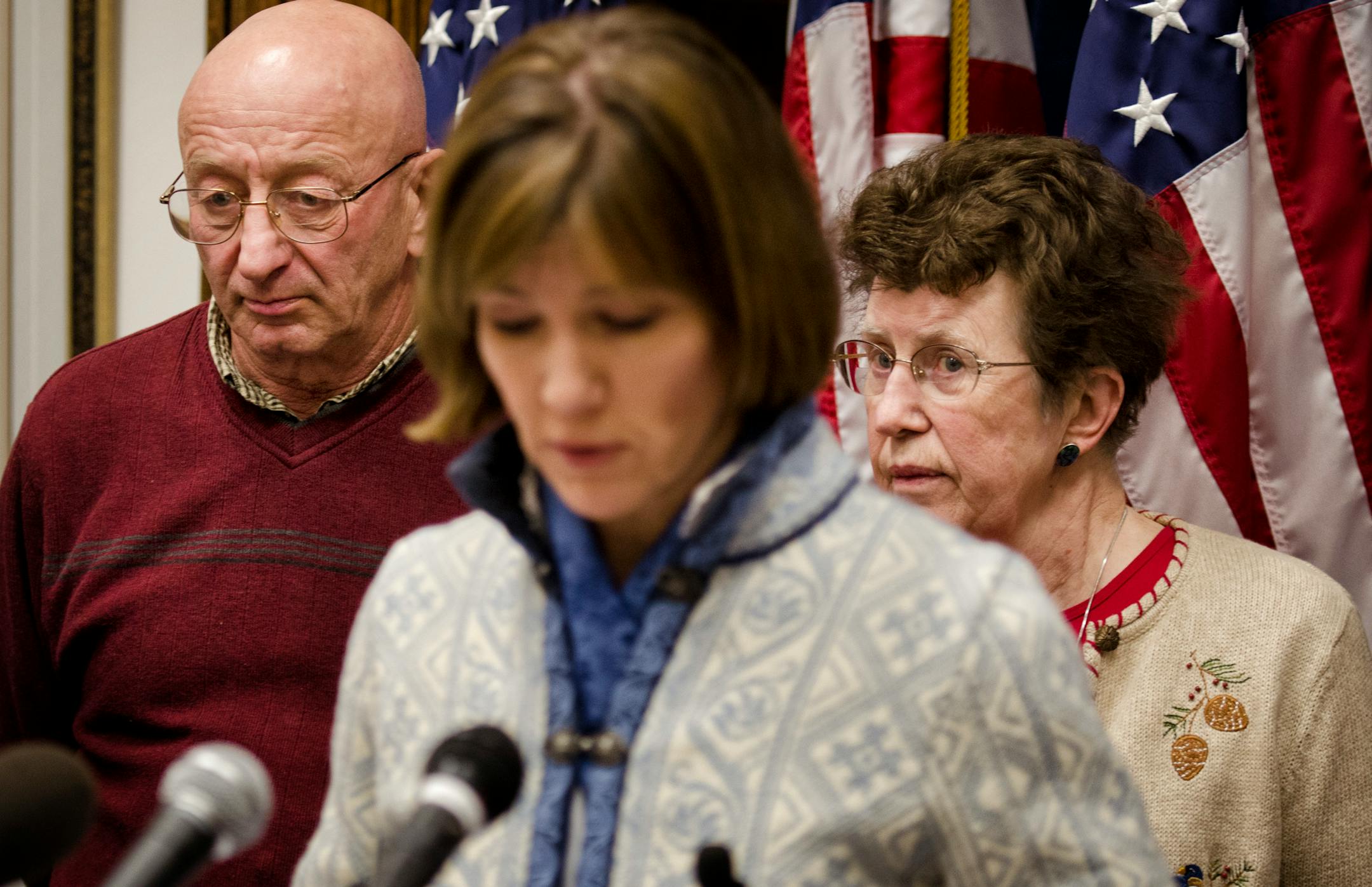 Attorney General Lori Swanson, center, filed suit against Renewable Energy SD on behalf of Marvin and Marlys Jensen of Kensington, Minn., and other farmers who lost money on energy investment.