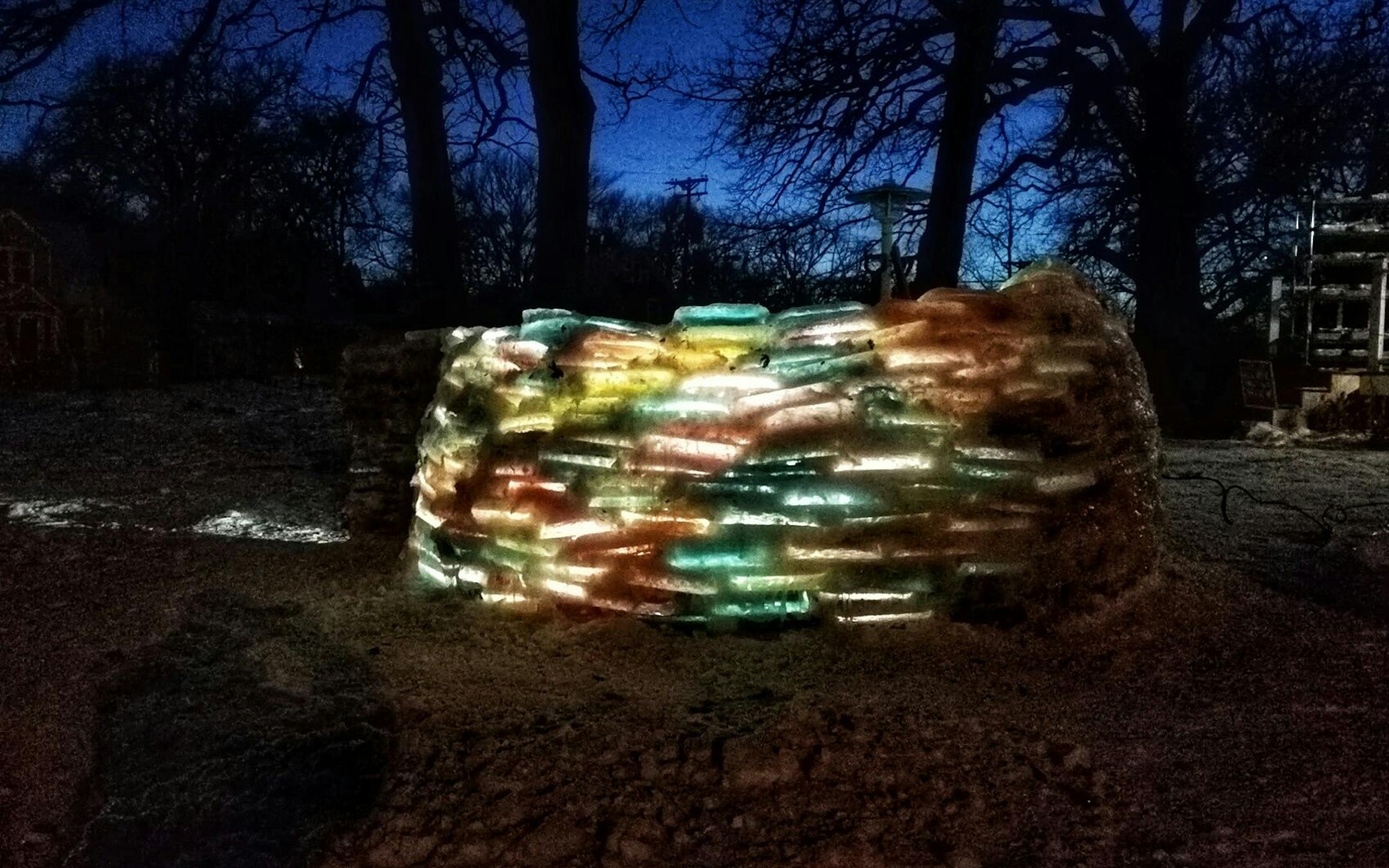 Martha Palm, her family and some former students of hers will be working on the multi-colored igloo they are building at the Palms' south Minneapolis home and seen Saturday, Dec. 30, 2017, in Minneapolis, MN. Here, lights illuminate the igloo at dark in a contributed photo.