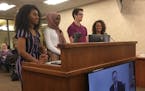 Students Naomi Gedey, Hafsa Ahmad, Emiliano Granados and teacher Jessica Davis spoke before the school board in April, seeking to wear sashes at gradu