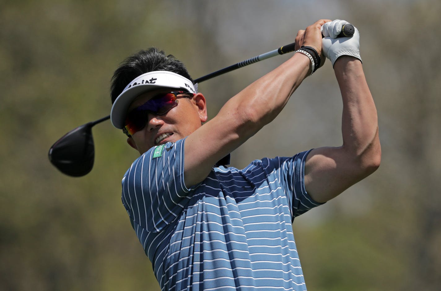 Y.E. Yang, of South Korea, hits off the 12th tee during the first round of the PGA Championship golf tournament, Thursday, May 16, 2019, at Bethpage Black in Farmingdale, N.Y. (AP Photo/Charles Krupa)