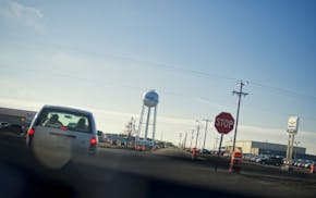 Benton County sheriff's deputy patrolled through downtown Foley, Minn. (October 31, 2011.)