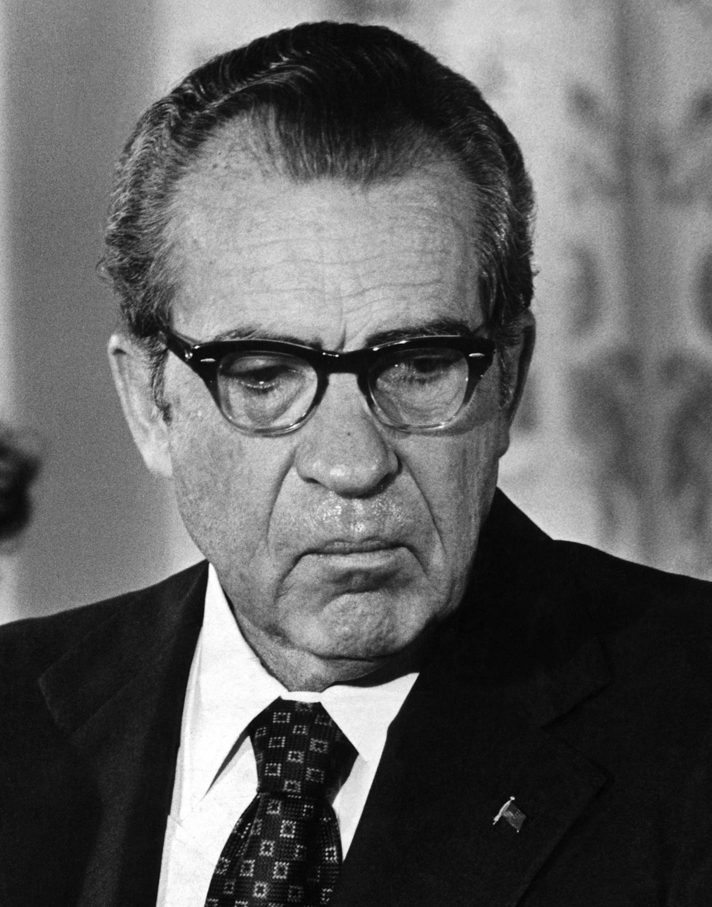 FILE -- President Richard M. Nixon says an emotional goodbye to his Cabinet and staff at the White House on Aug. 9, 1974. At left is his daughter, Julie Nixon Eisenhower. Nixon was driven from office by the Watergate scandal, resigning in the face of certain impeachment. (Mike Lien/The New York Times)