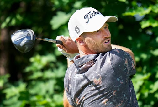 Wyndham Clark hits his tee shot on the 14th hole during round two of the Canadian Open