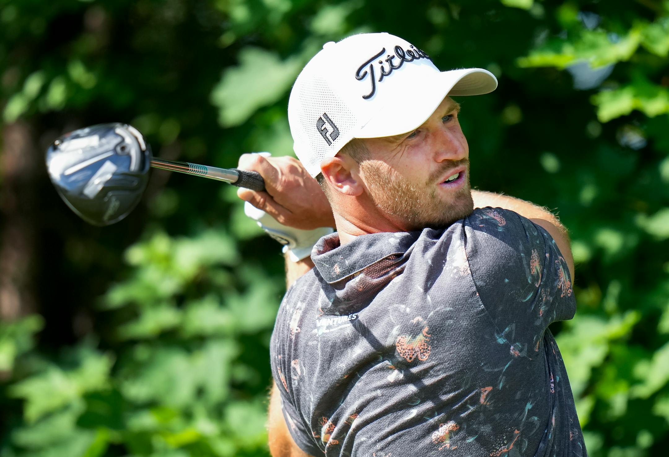Wyndham Clark hits his tee shot on the 14th hole during round two of the Canadian Open