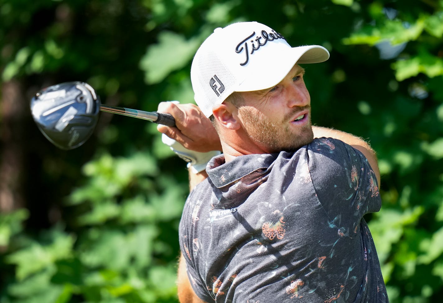 Wyndham Clark hits his tee shot on the 14th hole during round two of the Canadian Open