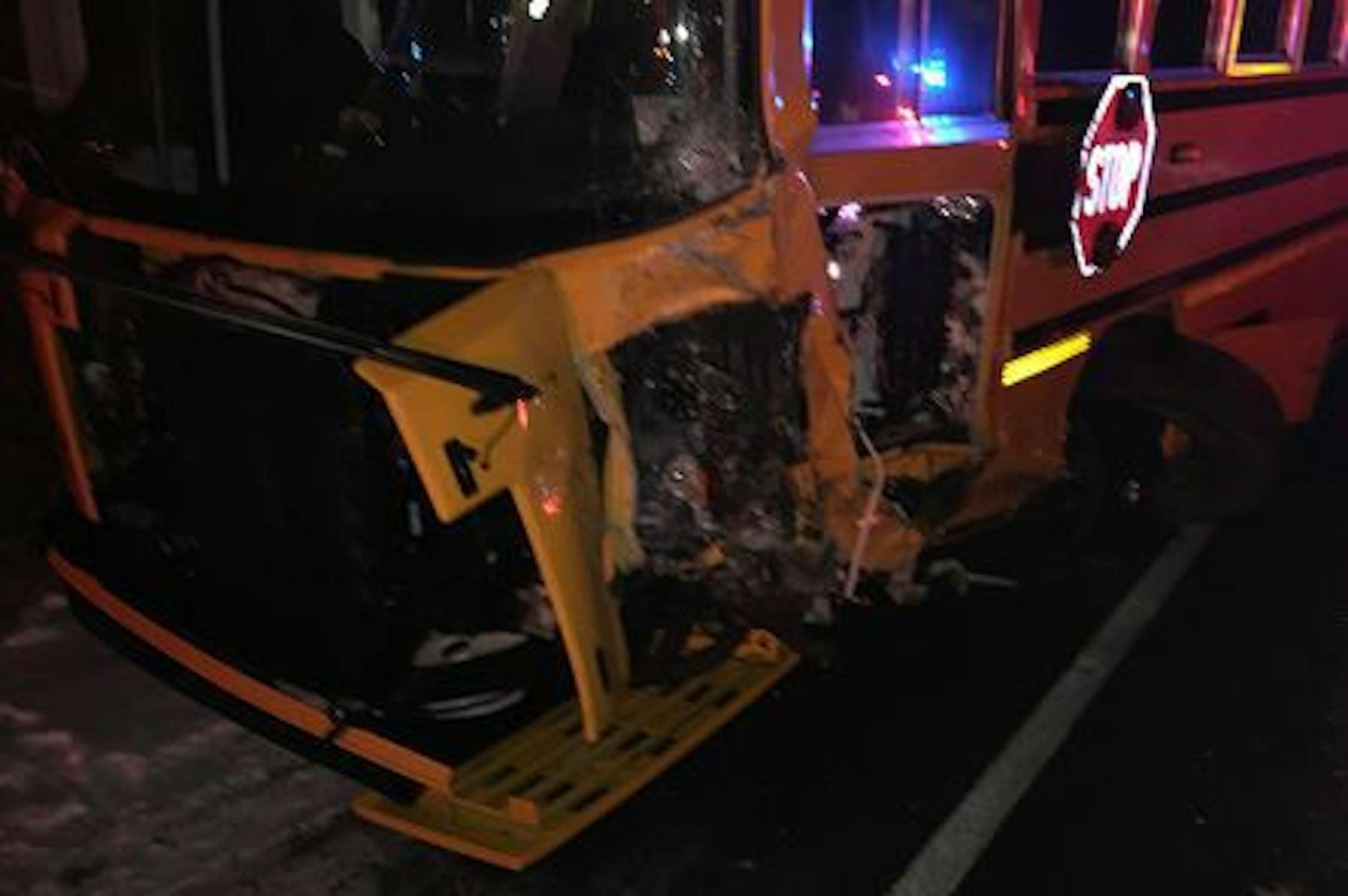 A car hit this bus occupied by the Amery High School girls basketball team.