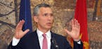NATO Secretary-General Jens Stoltenberg speaks and gestures after talks with Montenegro's Prime Minister Milo Djukanovic, in Podgorica, Montenegro, Th