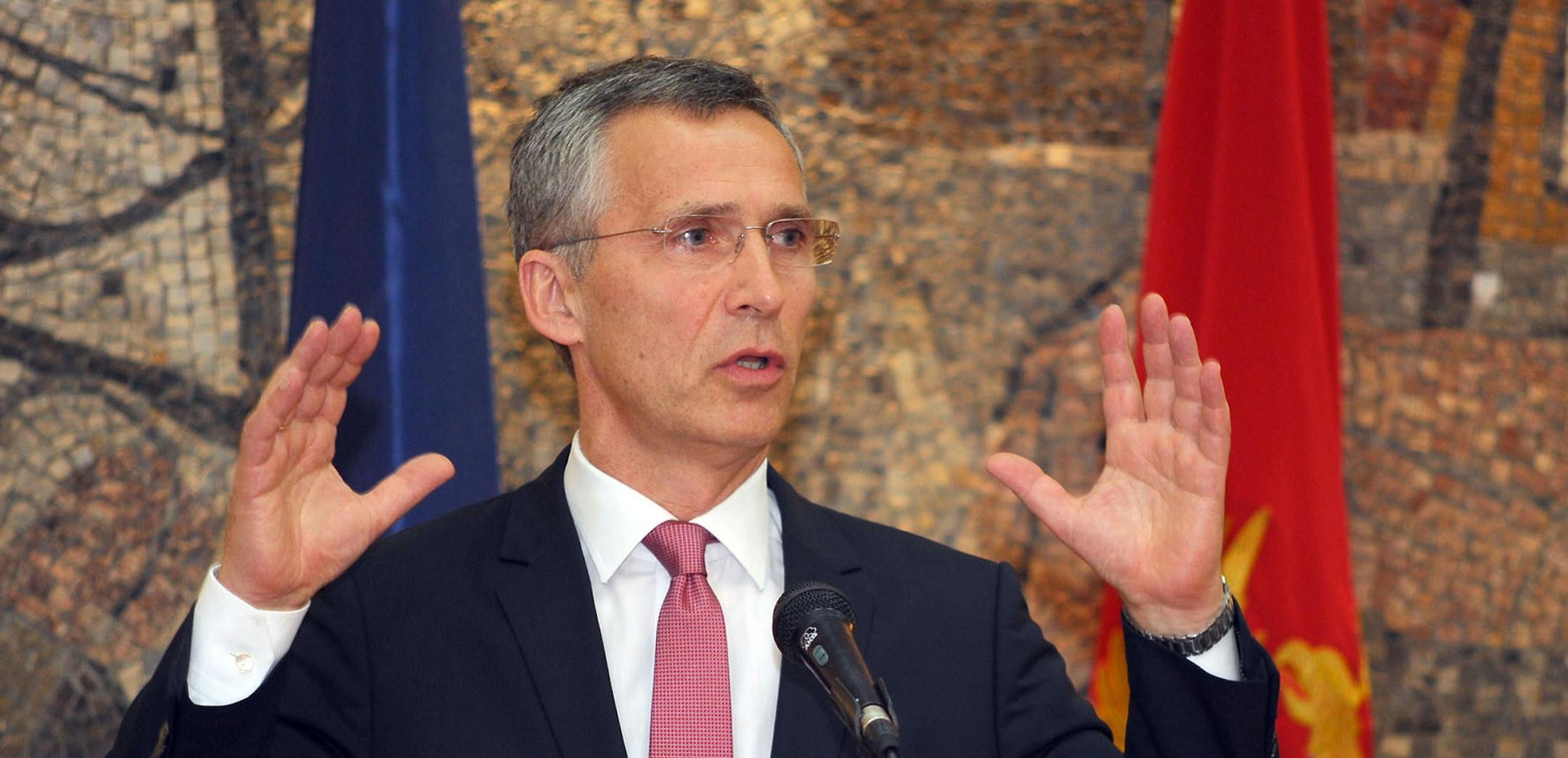 NATO Secretary-General Jens Stoltenberg speaks and gestures after talks with Montenegro's Prime Minister Milo Djukanovic, in Podgorica, Montenegro, Thursday, June 11, 2015. Montenegro will have to beef up its public support for NATO and strengthen the rule of law before it can become a member, the alliance's secretary-general said Thursday. (AP Photo/Risto Bozovic) ORG XMIT: MIN2015061817335694