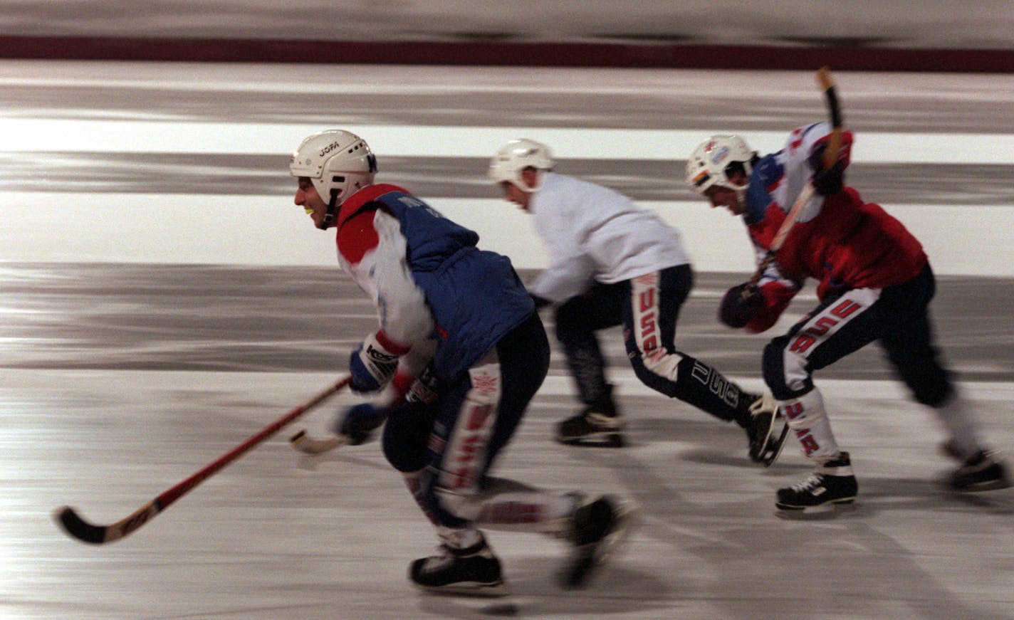 John Dreyling of Vandis Heights, left, Chris Preiss of Minneapolis, and Chris Halden of Minnetonka, all members of the U.S. Bandy team, skated around the track at the John Rose Oval during a bandy practice in 1998.