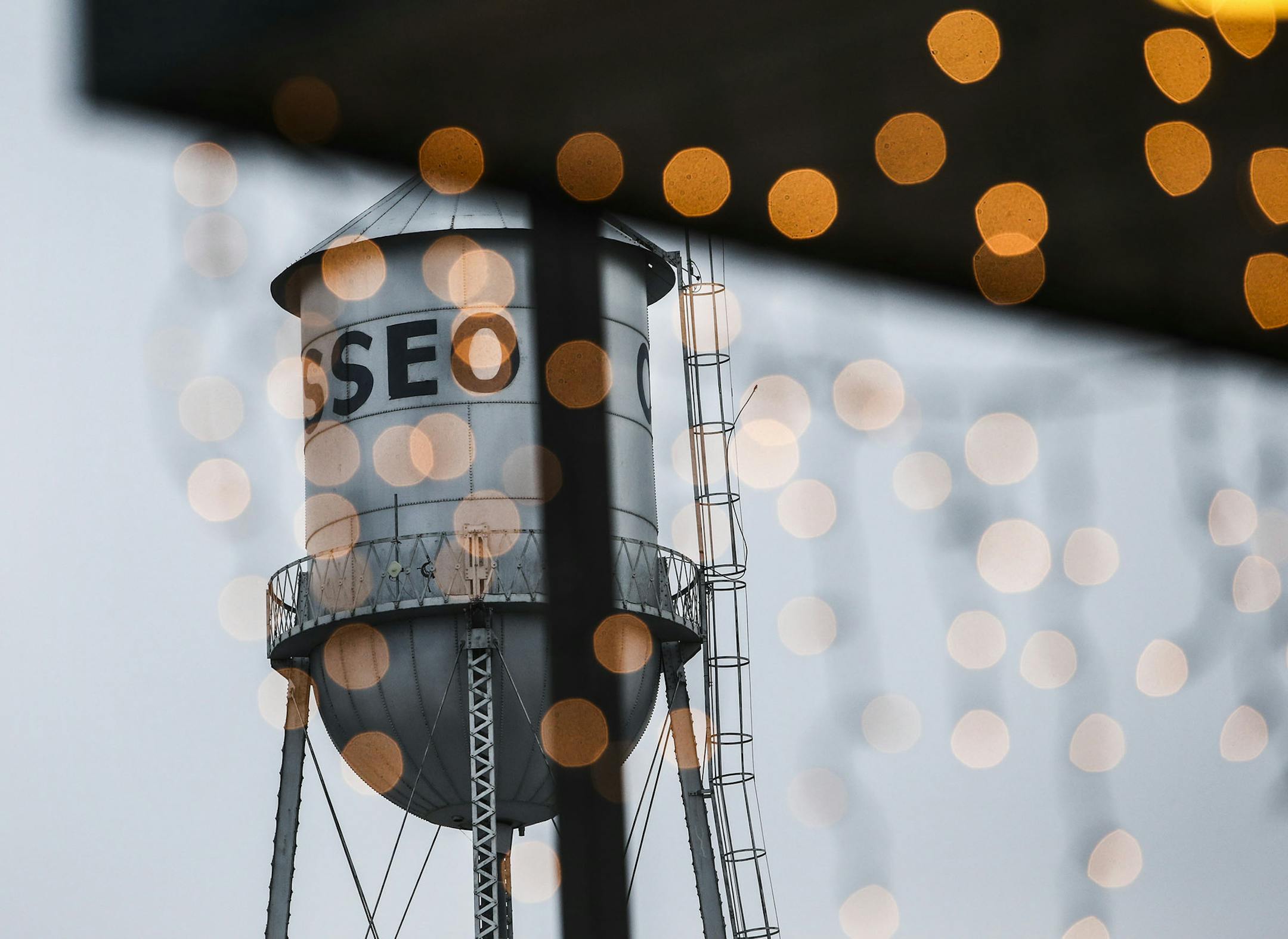 The Osseo water tower is seen through Christmas lights hanging from Dean's Super Market on Central Avenue in downtown Osseo Thursday, Dec. 18, 2014, in Osseo, MN.](DAVID JOLES/STARTRIBUNE)djoles@startribune.com Coon Rapids uses a spunky little raccoon. Blaine's features a pair of majestic trees and a rather low-slung suburban skyline. Robbinsdale's has a sleek little robin all in blue. Now what says Osseo's in one glance. The city has hired a design firm to come up with a new logo for the histor