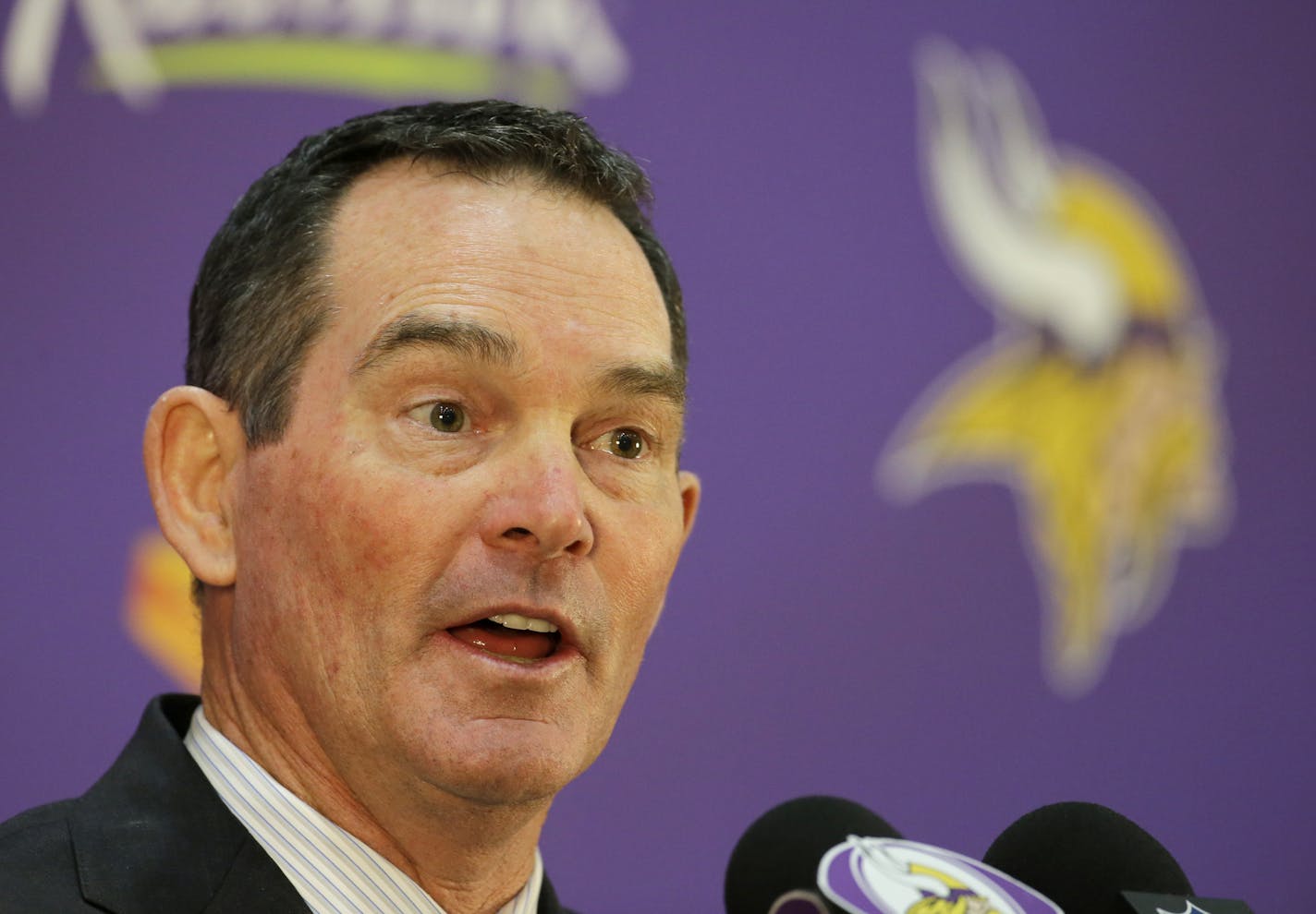 New Minnesota Vikings head coach Mike Zimmer answers a question during a media availability at Winter Park in Eden Prairie, Minn., Friday, Jan. 17, 2014. Zimmer is the ninth head coach in the Vikings franchise history.(AP Photo/Ann Heisenfelt)