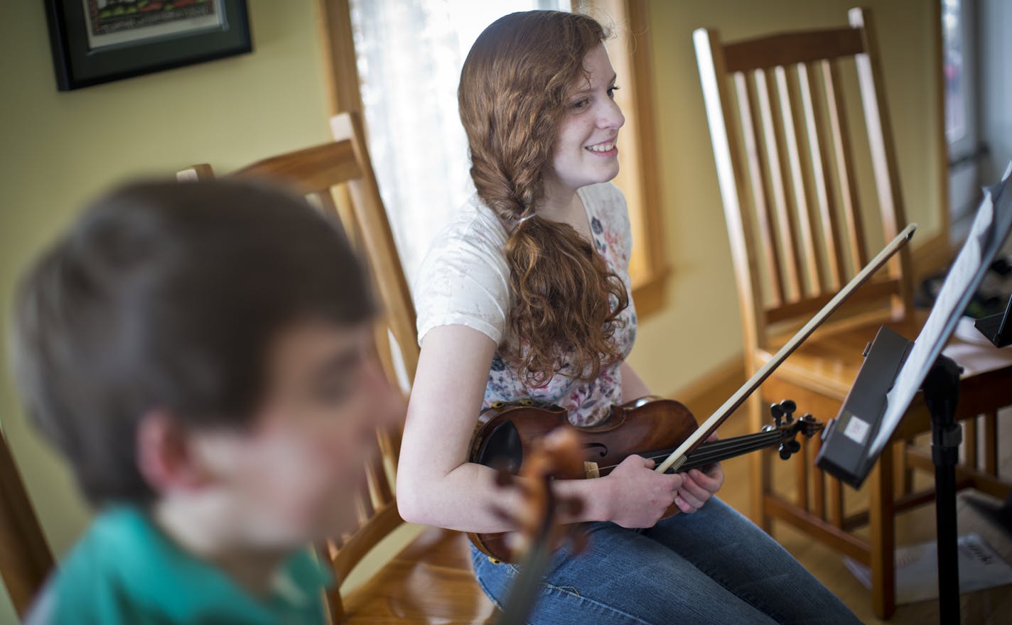 There was a time when Georgiann Steely, 16, couldn't pick up a phone or knock on a door without her knees knocking and her palms sweating with anxiety. During that time she spent almost all her days in her bedroom. Her family discovered she had depression and anxiety and is now treated for it with counseling and meds. She is now part of a musical ensemble that practiced at a friends house on Friday, March 29, 2013 in Rochester, Minn. ] (RENEE JONES SCHNEIDER * reneejones@startribune.com)