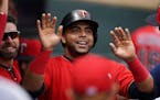 Nelson Cruz (23) celebrated with his teammates in the dugout during a game against the Rays last month.