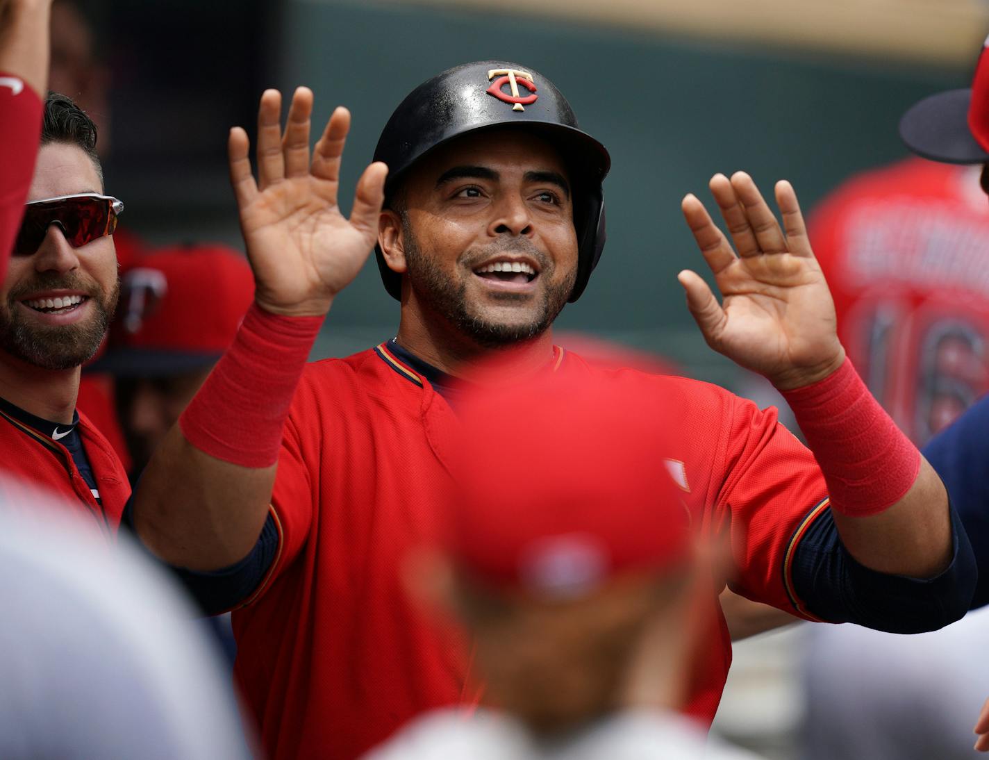 Nelson Cruz (23) celebrated with his teammates in the dugout during a game against the Rays last month.