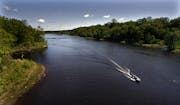 Minneapolis/May 16, 2009/10:30AM Fishermen sped along the St. Croix River near Osceola, WI. in search of a productive spot to fish. The St. Croix is a