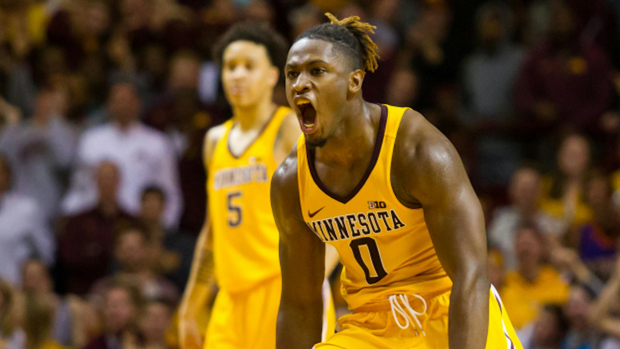 MINNEAPOLIS, MN - JANUARY 21: Minnesota Golden Gophers guard Akeem Springs (0) reacts after hitting the game tying 3 point shot to make it 67-67 late in the 2nd half during the Big Ten Conference match up between the Wisconsin Badgers and the Minnesota Golden Gophers on January 21, 2017 at Williams Arena in Minneapolis, Minnesota. (Photo by David Berding/Icon Sportswire via Getty Images)