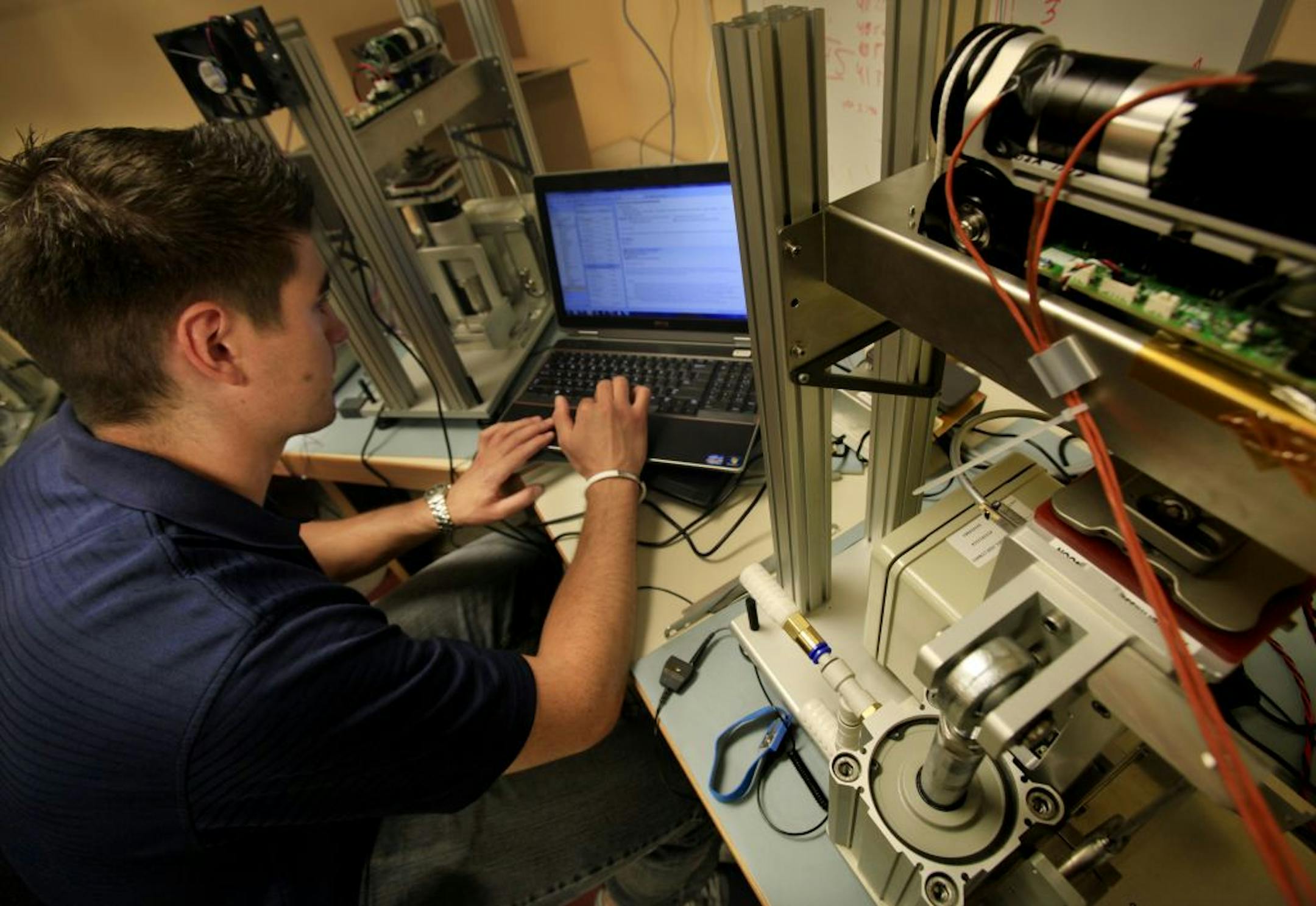 Andrew Serrian of Minnetronix works on a project in his office at 1635 Energy Park Drive, in St. Paul, MN. October 2, 2012.