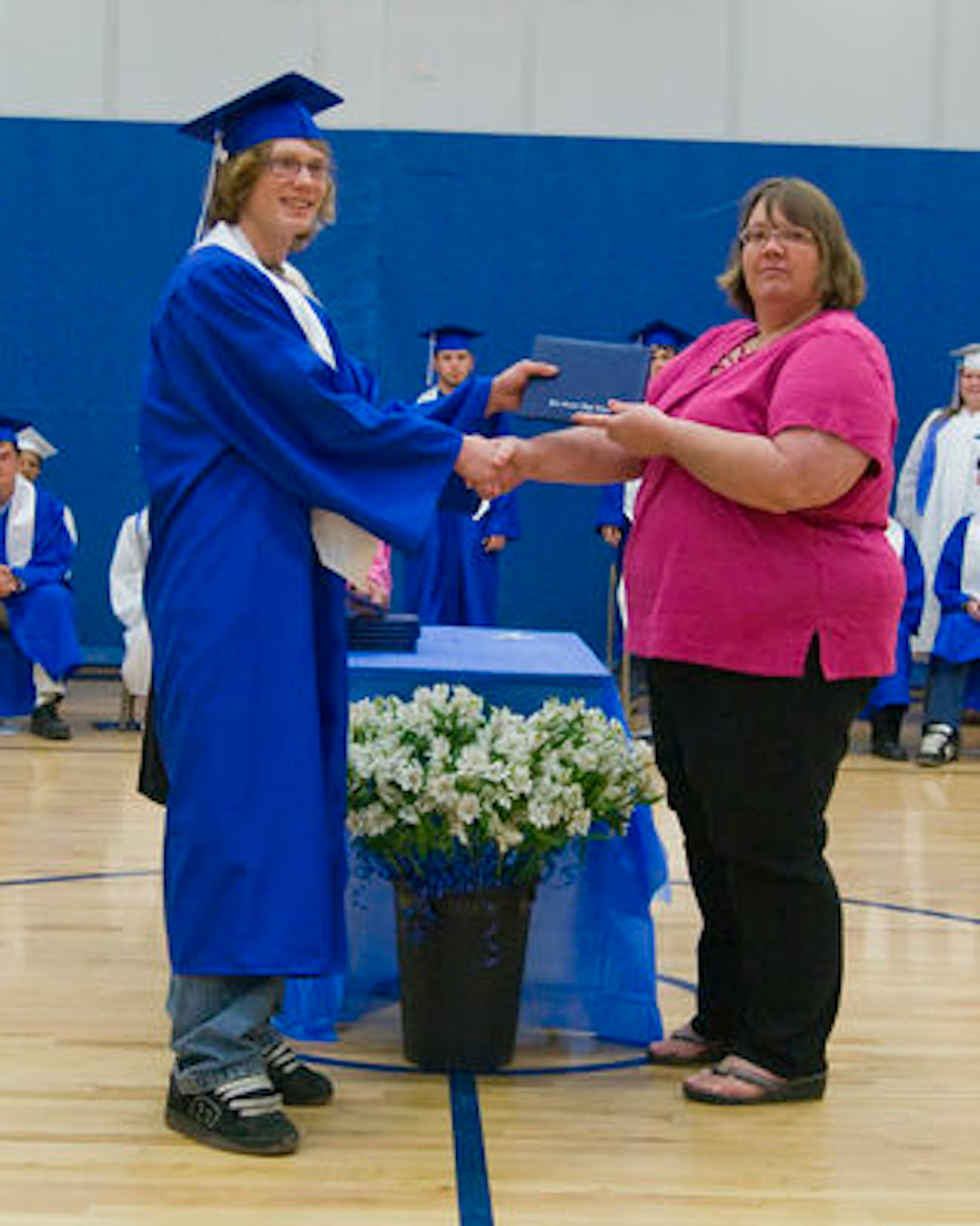 Brett Larson, at his East Central High School graduation ceremony in 2009.