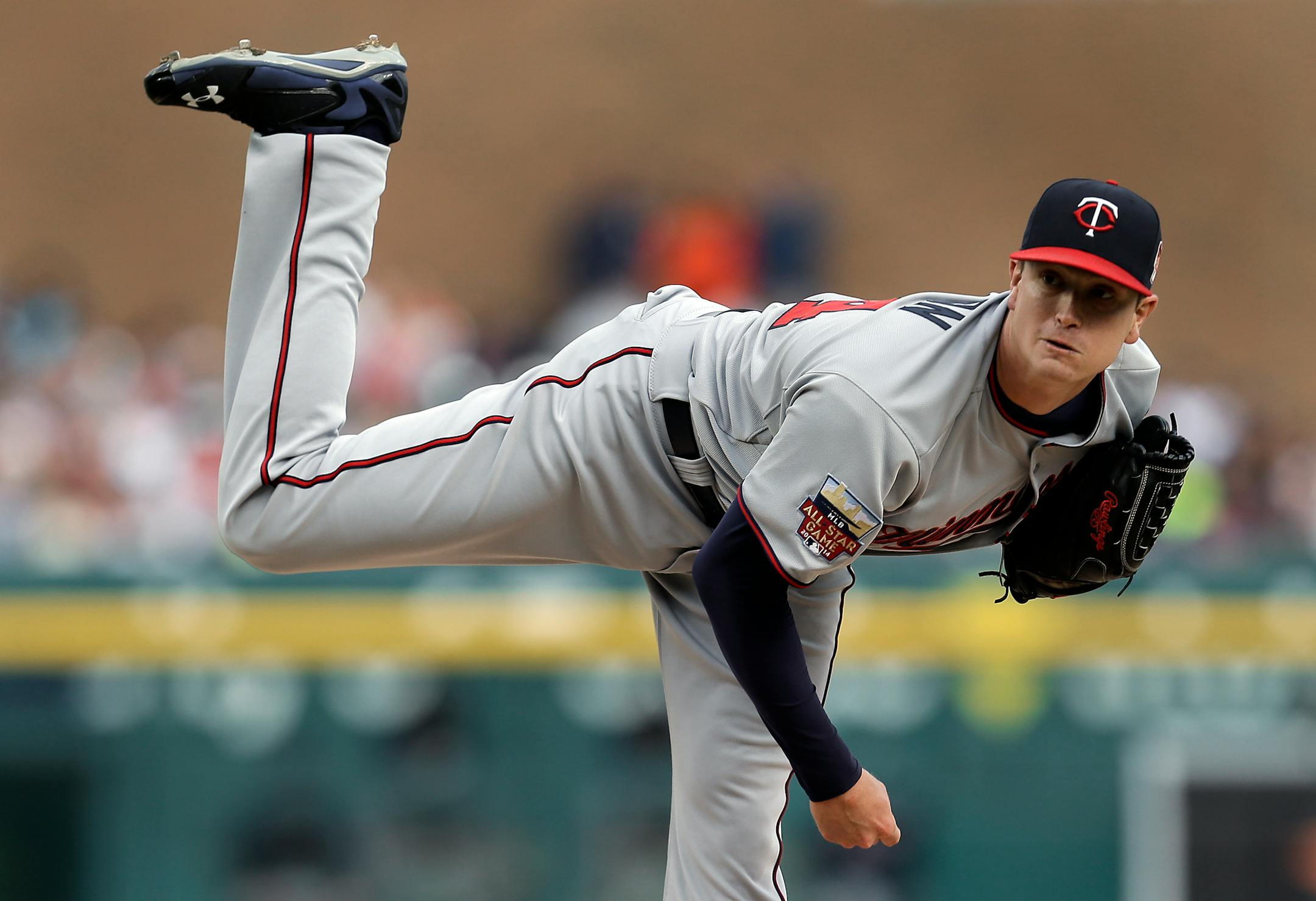 Minnesota Twins pitcher Kyle Gibson throws against the Detroit Tigers in the second inning of a baseball game in Detroit, Friday, June 13, 2014. (AP Photo/Paul Sancya)