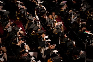 University of Minnesota students sit for the College of Liberal Arts’ graduation ceremony on May 12 in Minneapolis.