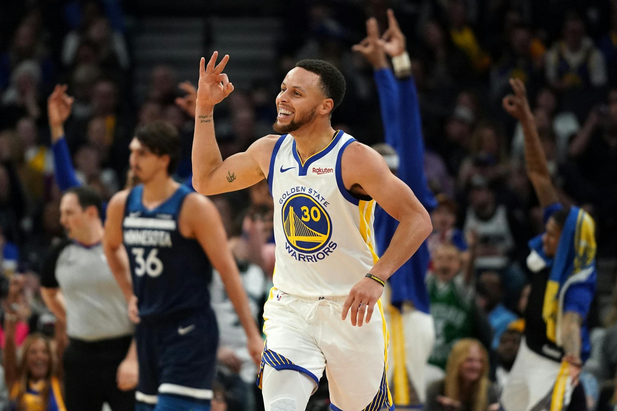 Golden State Warriors guard Stephen Curry (30) celebrated after hitting a three point shot late in the first half.
