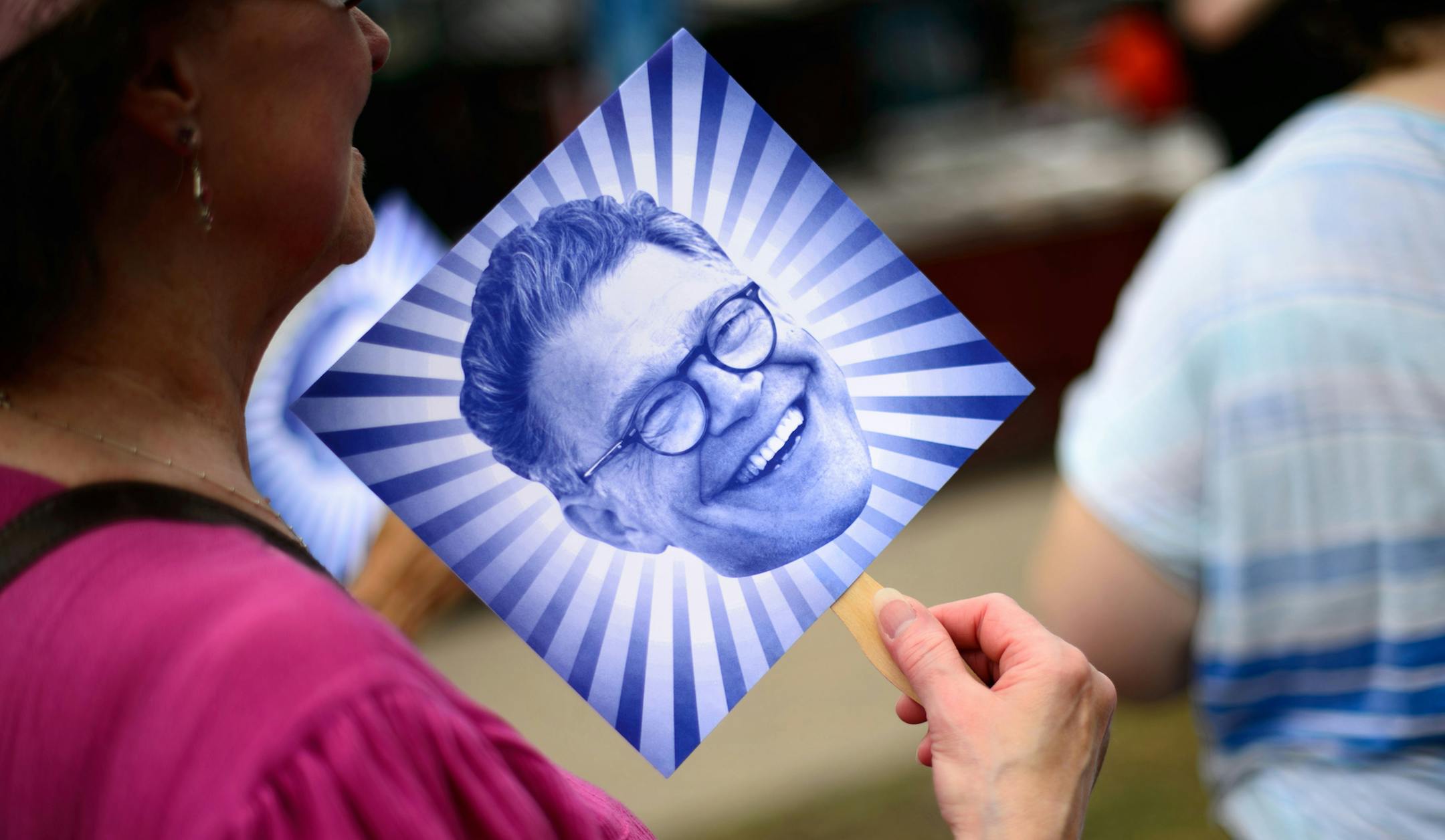 DFL Senator Al Franken handed out fans with his smiling image on them and greeted supporters in front of his booth Thursday morning at the first day of the State Fair. ] FALCON HEIGHTS, MN -- Thursday, August 21, 2014. GLEN STUBBE * gstubbe@startribune.com