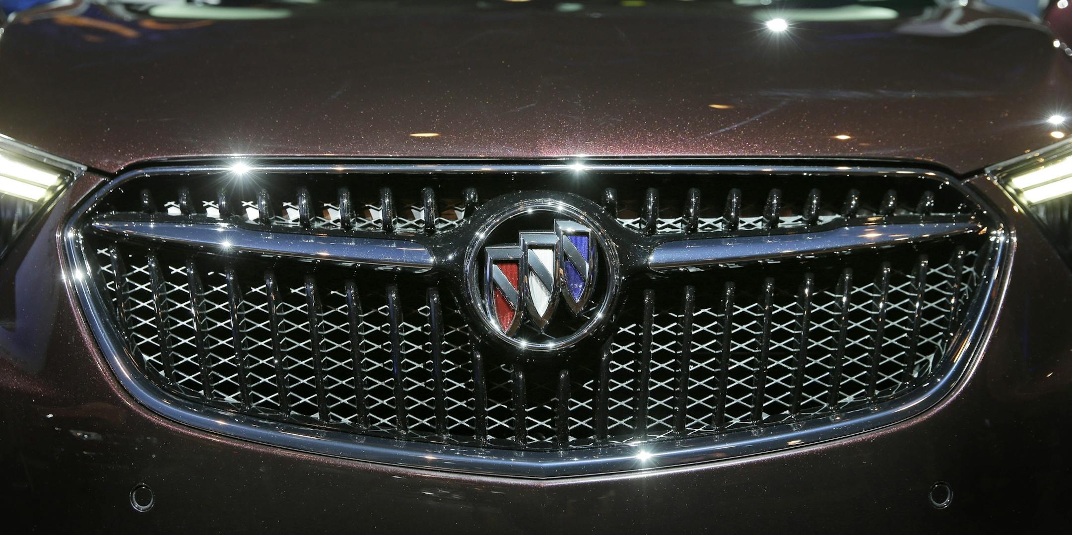 FILE - In this Tuesday, March 22, 2016, file photo, the new 2017 Buick Encore is displayed during a media preview in New York, as part of the New York International Auto Show. Lexus, Toyota and Buick are the most reliable brands in Consumer Reports’ latest survey, a reward for their conservative approach to new technology. Audi and Kia rounded out the top five brands. Dodge, Chrysler, Fiat and Ram, all owned by Fiat Chrysler Automobiles, were the worst performers. Electric car maker Tesla