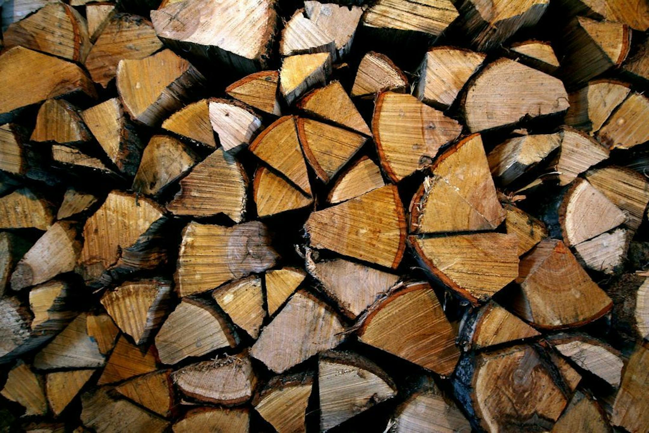 Stacked firewood in Keene, N.H., on Dec. 16, 2009. New England is a tradition-bound region that has clung to its wood stoves for sentimental reasons even as much of the country has declared them passe.